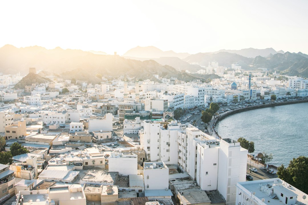 Muscat waterfront and city buildings for Oman property investment article